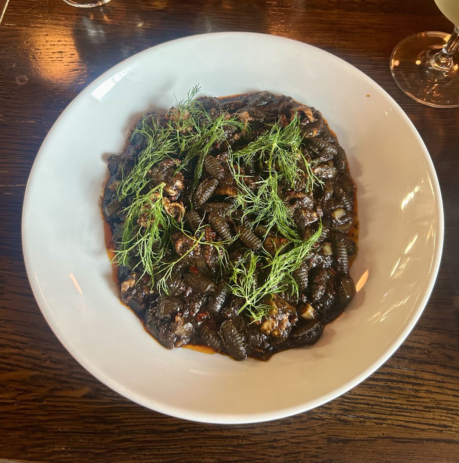 Squid ink gnocchi with octopus